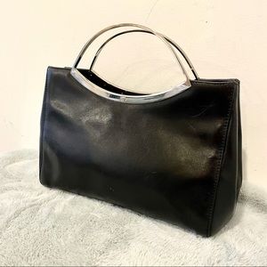 Authenticated Gianni Versace leather satchel purse